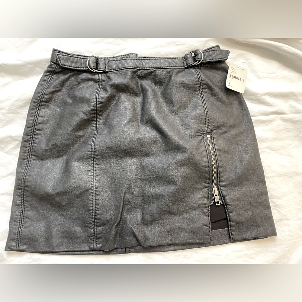 NWT Free People faux leather mini skirt in size 4.